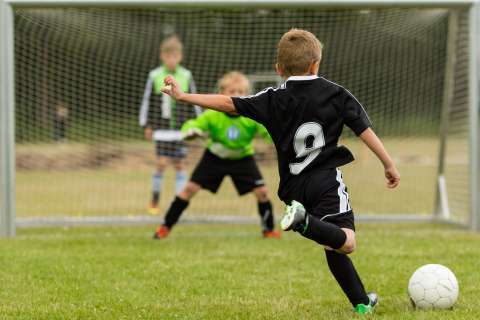 bigstock-Kids-Soccer-Penalty-Kick-67087828